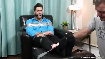Business man Blayne tied up with duct tape and feet licked