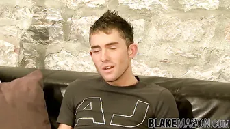 Slim twink Kane jerks off big throbbing dick after interview