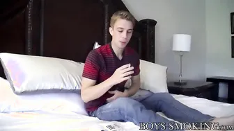 Kinky young lad smokes and masturbates