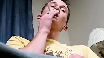 Skinny cigar smoker plays with his hairy cock and cums