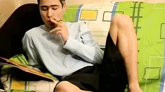 Chain smoking twink strokes his hard rod