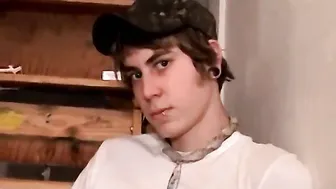 Cigar smoking twink jerks off hairy cock and jizzes in tray