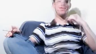 Cute twink smoker squirts cum before finishing cigarette