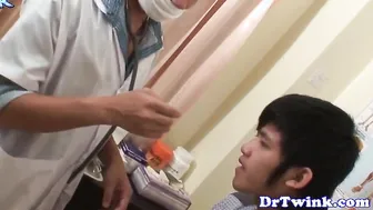Asian twink prostate checked with big dildo