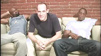 Middle aged white guy getting shared by black men